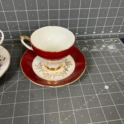 2 Tea Cups and Saucers: White and Purple and Red & Gold 