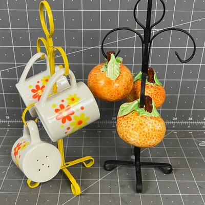 3 each with Stands Orange and Flower Salt & Peppers