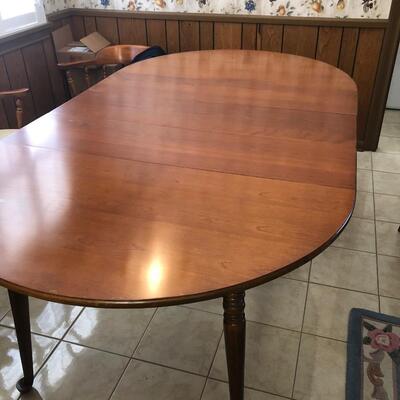 maple round or oval table (3 leaves) with 6 barrel back chairs