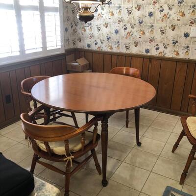 maple round or oval table (3 leaves) with 6 barrel back chairs