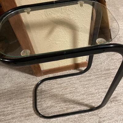 Glass and black frame side table
