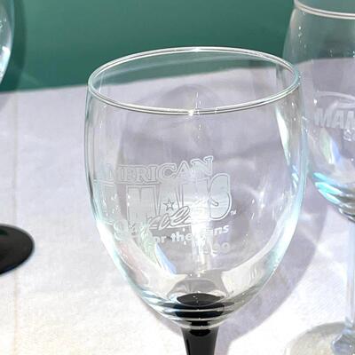 Lot 150 Lot 6 Wine Glasses "American Lemons Series" Black & Clear Stems Plastic Car
