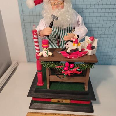 Musical santa in workshop