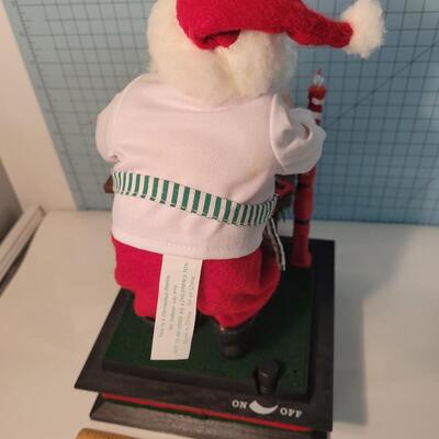 Musical santa in workshop
