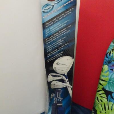 LOT 644. KIDS GOLF CLUB SET STILL IN BOX, BODY BOARD AND ADIDAS BACK PACK