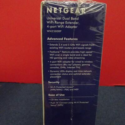 LOT 646. MISC BOOKS, WI FI EXTENDER