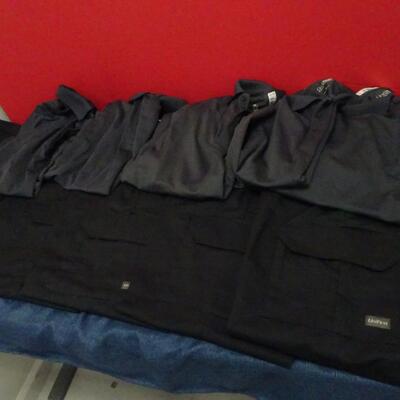 LOT 647. WORK PANTS AND POLO SHIRTS