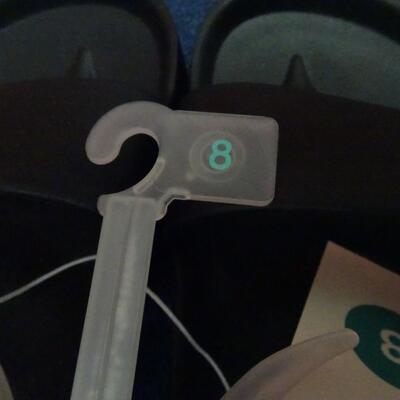 LOT 652. THREE PAIR OF VANS AND SANDALS