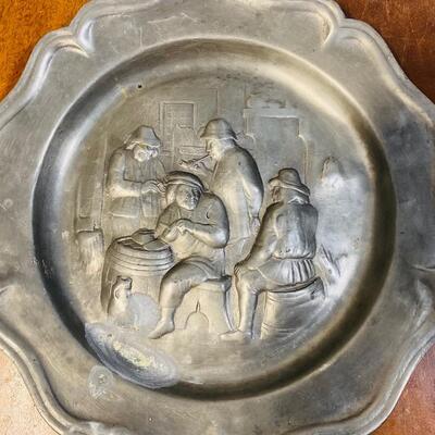 Figural pewter plate