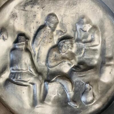 Figural pewter plate