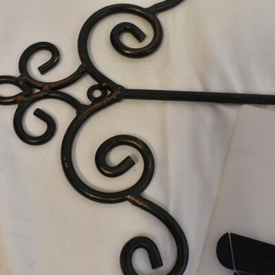 2 Wall hanging racks for plates, black metal w/ scroll design, 43in, 26 1/2in