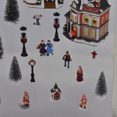 Holiday Time Village House, missing several pieces, has all buildings