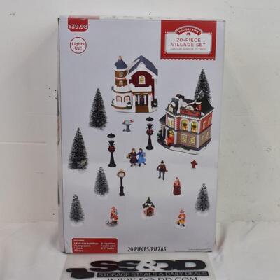 Holiday Time Village House, missing several pieces, has all buildings