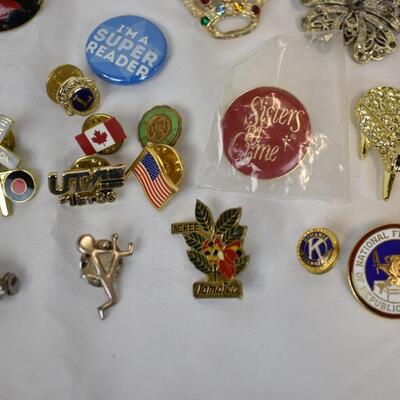 34 pc Pins and Brooches: Flags, Feather, Las Vegas, Flowers, etc