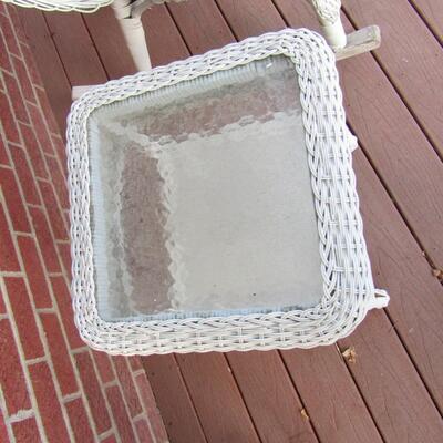 LOT 6  OUTDOOR WICKER ROCKER AND GLASS TOP SIDE TABLE