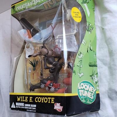 Create a scene Wile E Coyote figurine