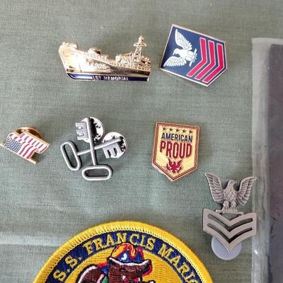 LOT 28 MILITARY PATCHES AND HAT PINS