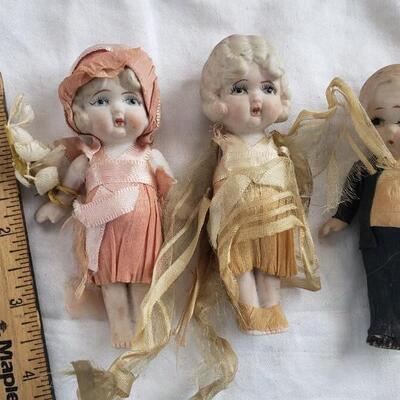 3 kewpie dolls