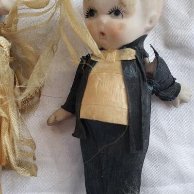 3 kewpie dolls