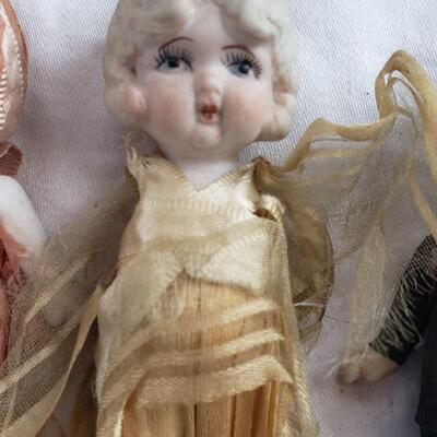 3 kewpie dolls