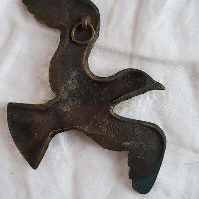 Vintage brass bird ready for hanging
