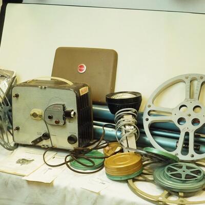 146- Vintage super 8 movie projector, film, reels, screens