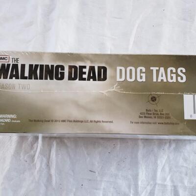 Store display with 24 packs dog tags Walking Dead