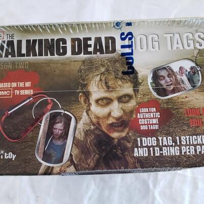 Store display with 24 packs dog tags Walking Dead