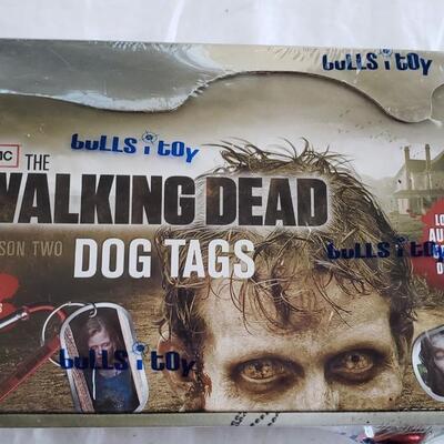 Store display with 24 packs dog tags Walking Dead
