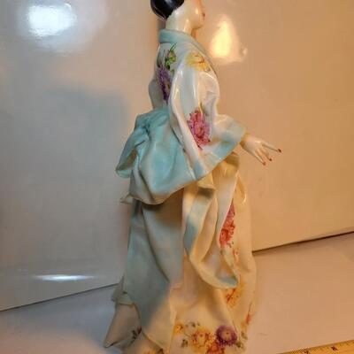 Tall porcelain/ bone China figure.