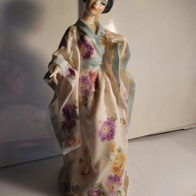 Tall porcelain/ bone China figure.