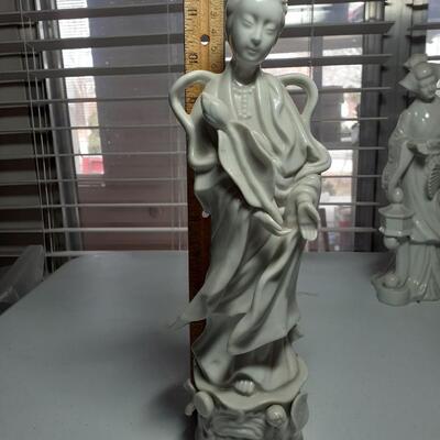 12in. Chinese woman holding flower