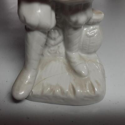 8in. Chinese man with bird