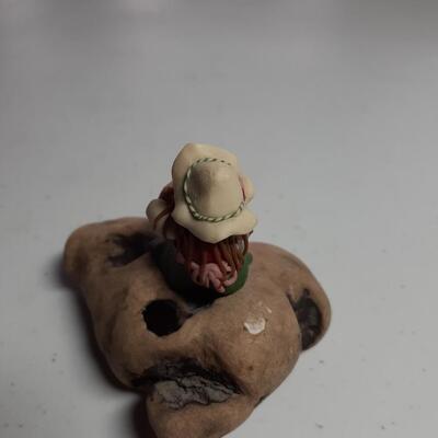 Woman on wood 3in.