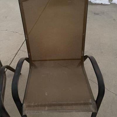 Two Brown Outdoor Chairs