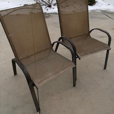 Two Brown Outdoor Chairs