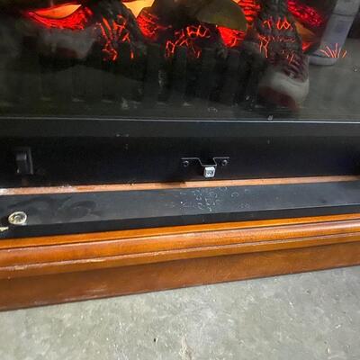 D8 Electric fireplace with heat, works well. Bottom corners are damaged, there is som other scratches as well.  11 1/4 deep, 36 3/4 w, 36...