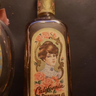 Early Avon bottles perfume one is full