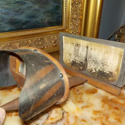 Stereograph viewer and view cards, 1900's.