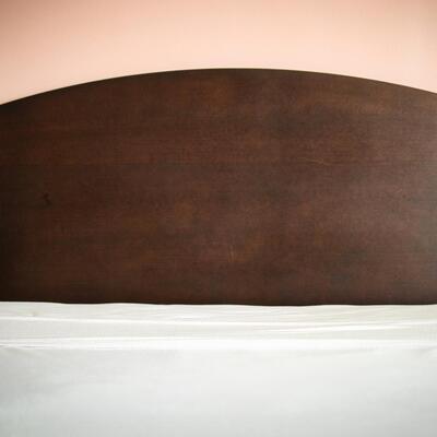 Queen-size bed with headboard