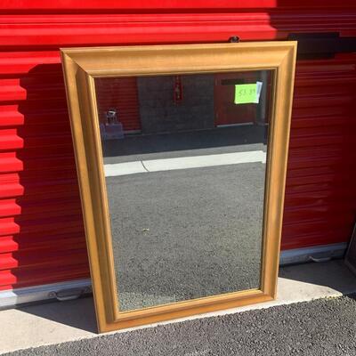 Mirror with gold/brown frame