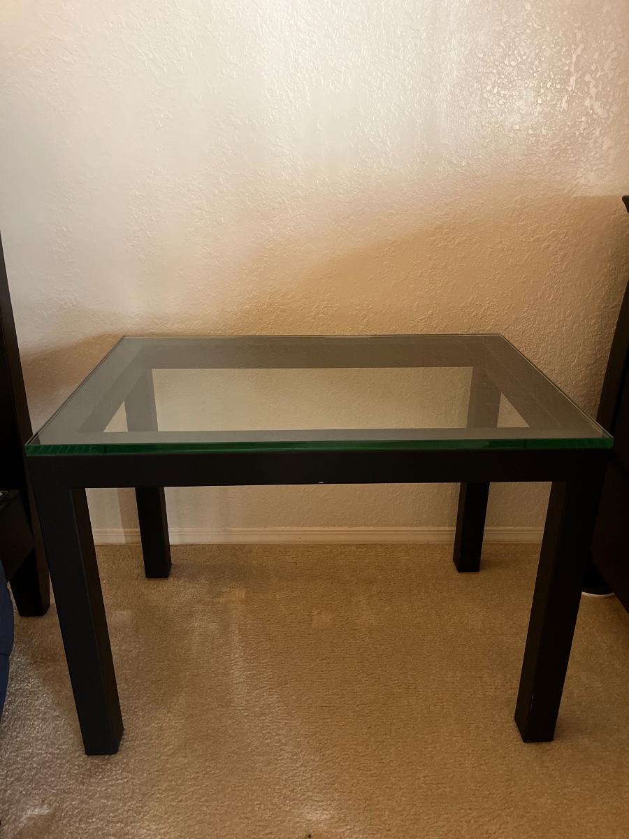 Black Metal Table with Glass Top ( 30” L, 20” W, 22” H) | EstateSales.org