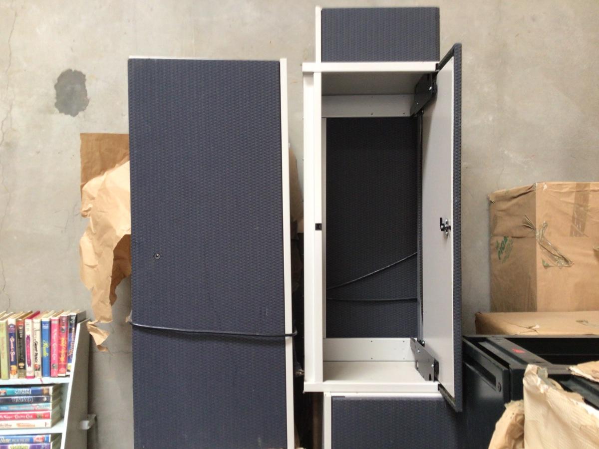 Cubicles under desk drawers and over desk storage with lights
