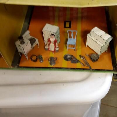 LOT 1  OLD METAL DOLL HOUSE WITH METAL FURNITURE