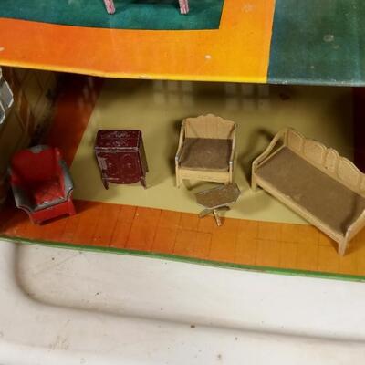 LOT 1  OLD METAL DOLL HOUSE WITH METAL FURNITURE