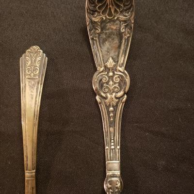 2 silver plate ladles ornate