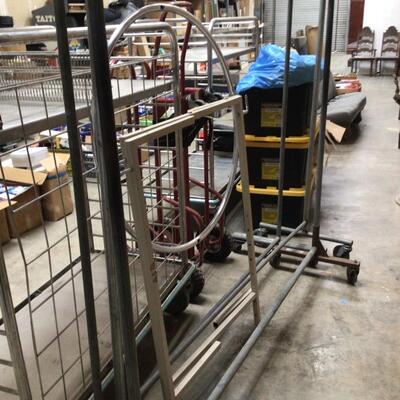 Three rolling clothes racks, One round clothes rack