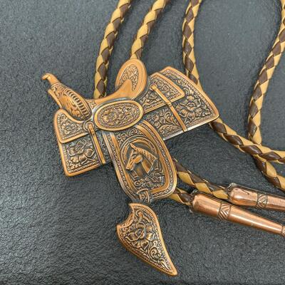 BROWN BOLO TIE W/ BRONZE TONED SADDLE SLIDE