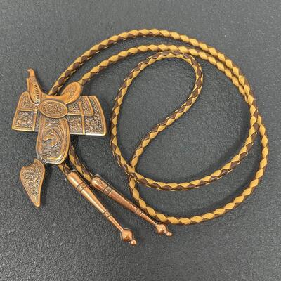 BROWN BOLO TIE W/ BRONZE TONED SADDLE SLIDE