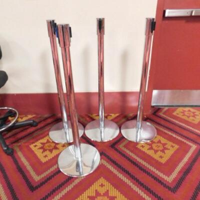 Set of Four or Chrome Finish Stanchions Marked 'Closed' on the Barrier Ribbon